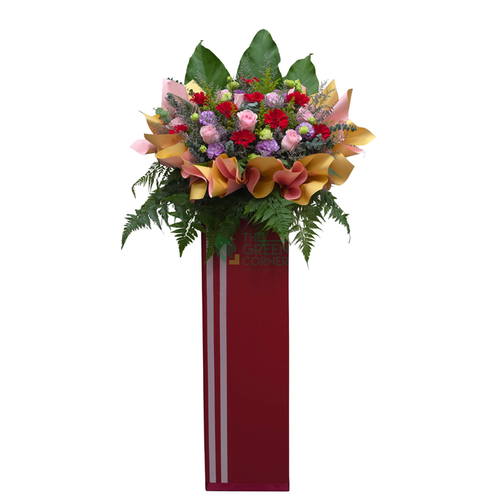 Ascension Floral grand opening flower stand in bold red and pink with gerbera, roses and purple eustoma — The Green Corner Singapore